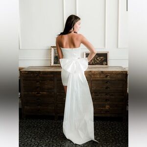White minidress with removable bow detail. Perfect for bridal event!